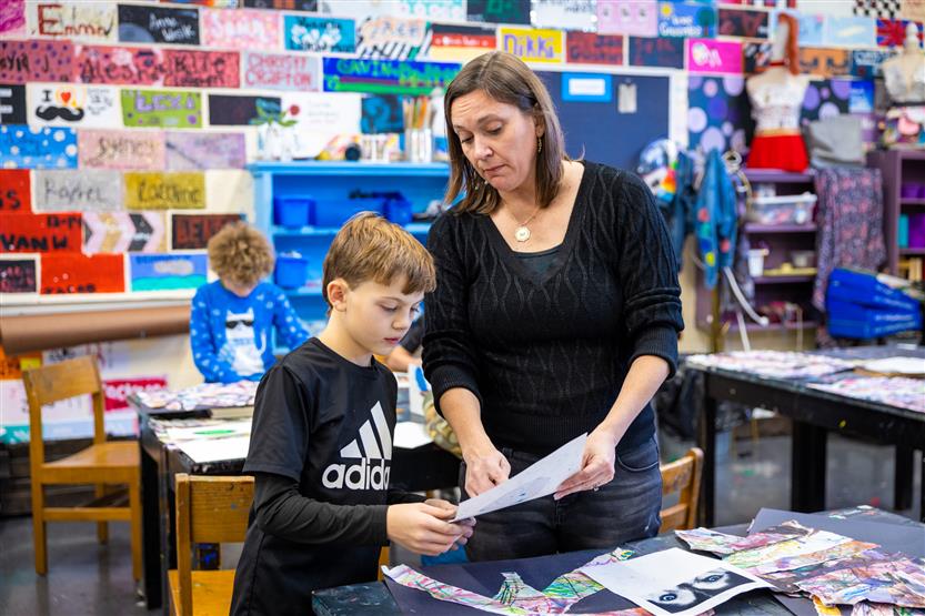 Students in an art class using oil pastels